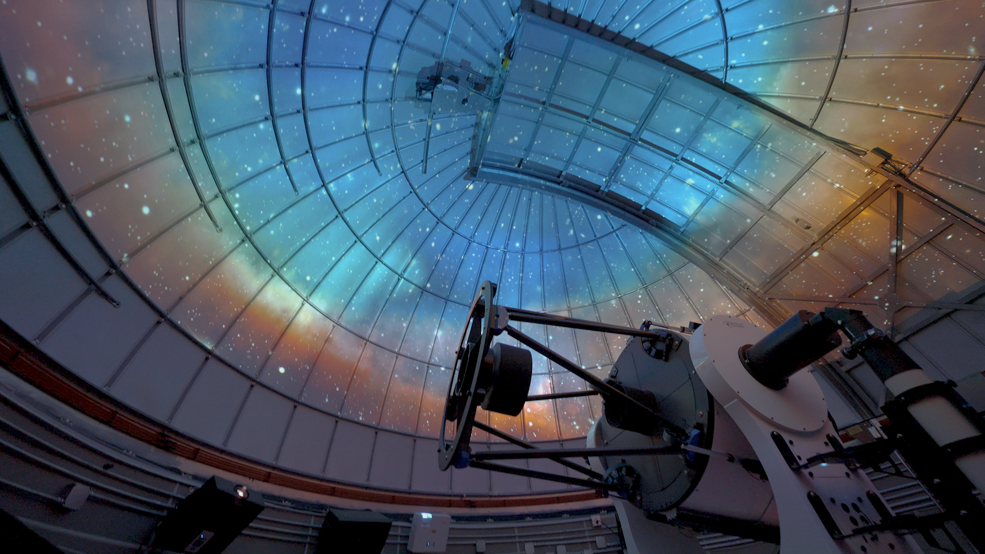 Projected stars fill the Rancho Mirage Observatory dome above its telescope